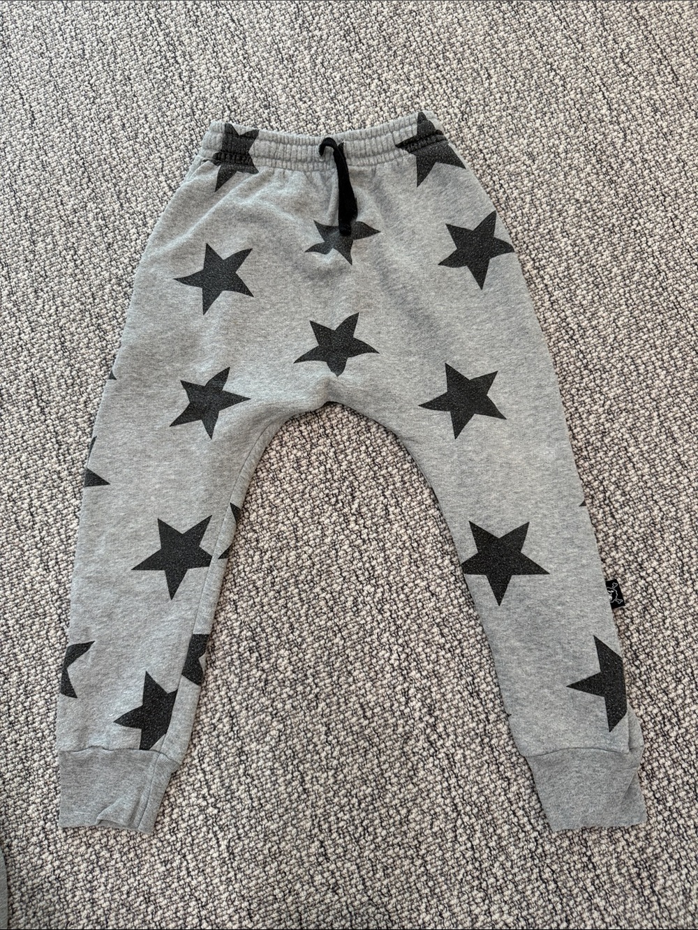 nununu Grey Sweatpants with Black Star Pattern